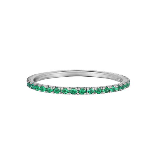 thin wedding band with green emerald stone diamonds