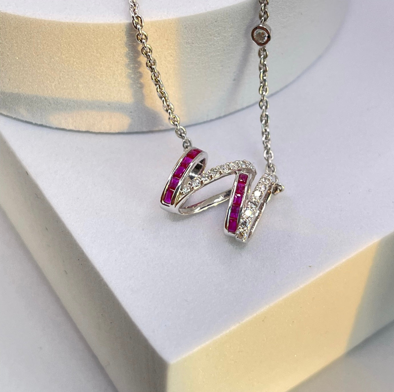 Nuntius pendant in ruby baguettes and diamonds mauni london