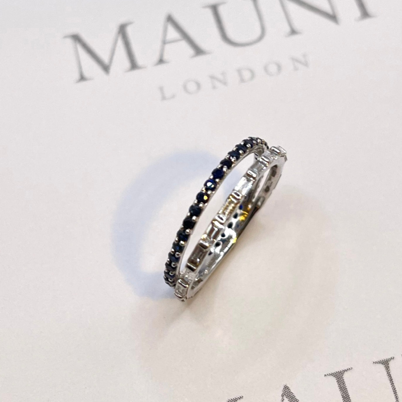 blue sapphires and baguette diamonds on a double ring mauni london